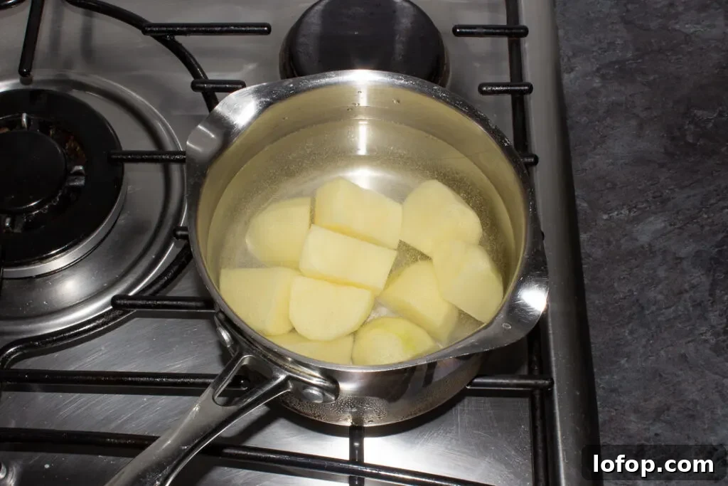 potatoes in a pan of water