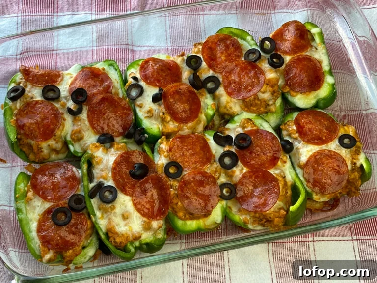 Creamy Pizza-Stuffed Bell Peppers Recipe for Weeknight Dinner 2 Pan of keto or low carb pizza stuffed peppers