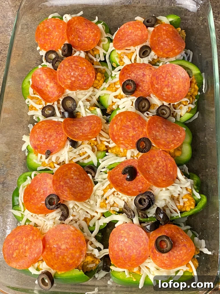 Creamy Pizza-Stuffed Bell Peppers Recipe for Weeknight Dinner 10 Pizza toppings on meat and cheese stuffed bell pepper recipe