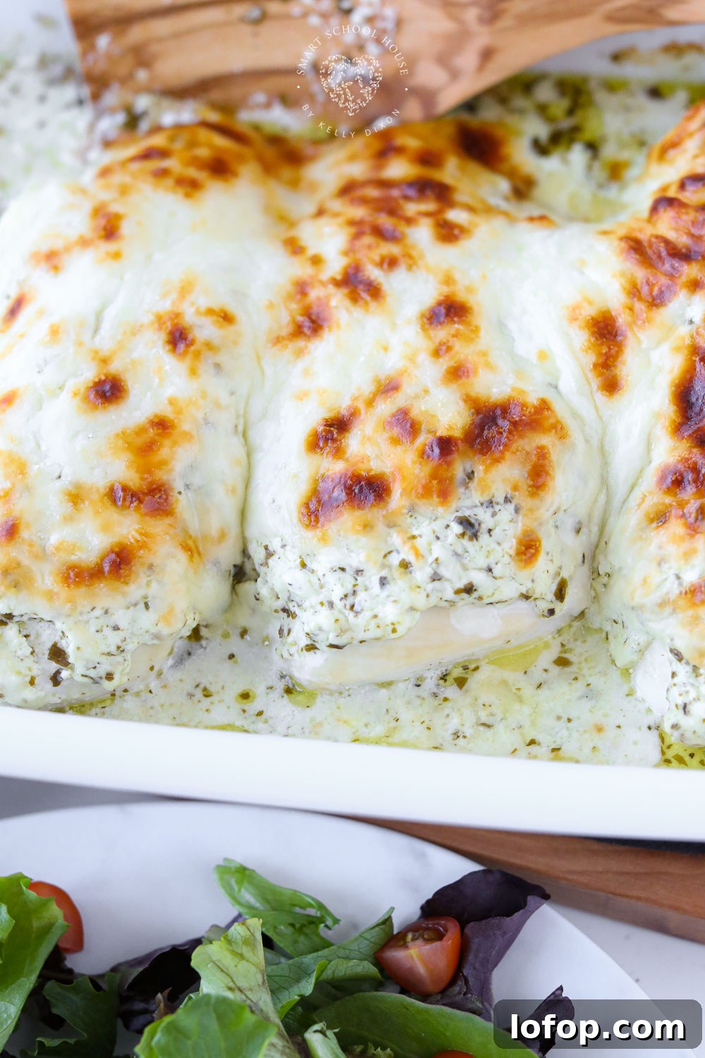 Creamy Pesto Chicken Recipe: Garlic Parmesan Skillet Meal 8 Creamy Pesto Chicken is an easy dinner recipe is made with chicken, cream cheese, pesto, and mozzarella! Simple ingredients that the entire family will love. Serve it with a side salad, rice, pasta, veggies, or anything else you'd like.