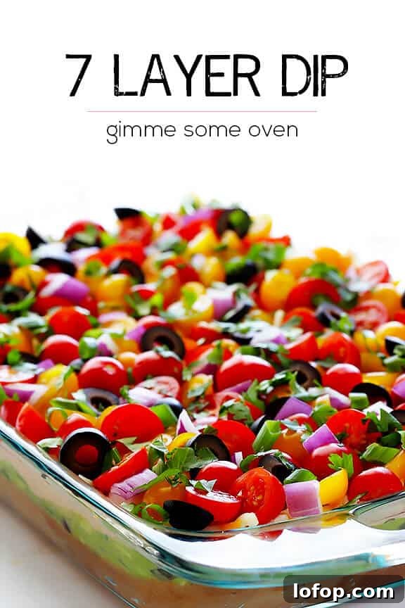 7 Layer Dip -- a fresh recipe for this classic dip that's always a crowd-pleaser! | gimmesomeoven.com #appetizer #gameday