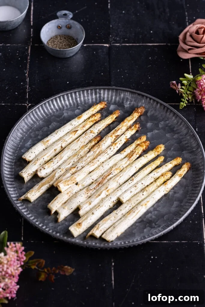 Roasted white asparagus on a platter