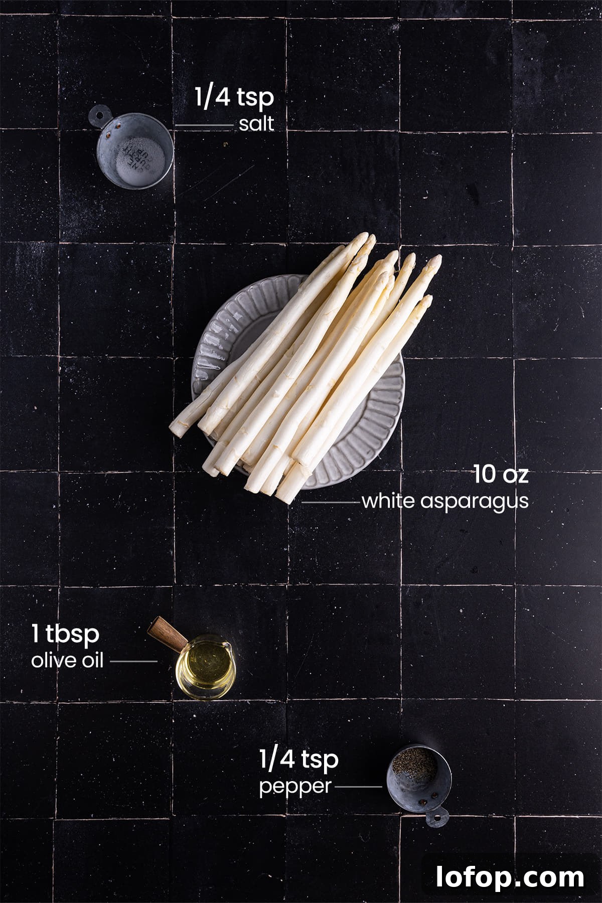 ingredients for the best white asparagus recipe - salt, pepper, olive oil, white asparagus