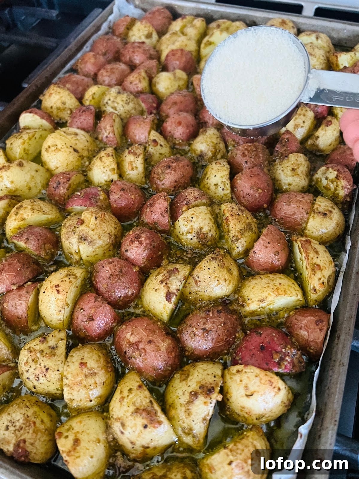 Pesto Potatoes on Sheet Pan with Pecorino Cheese.