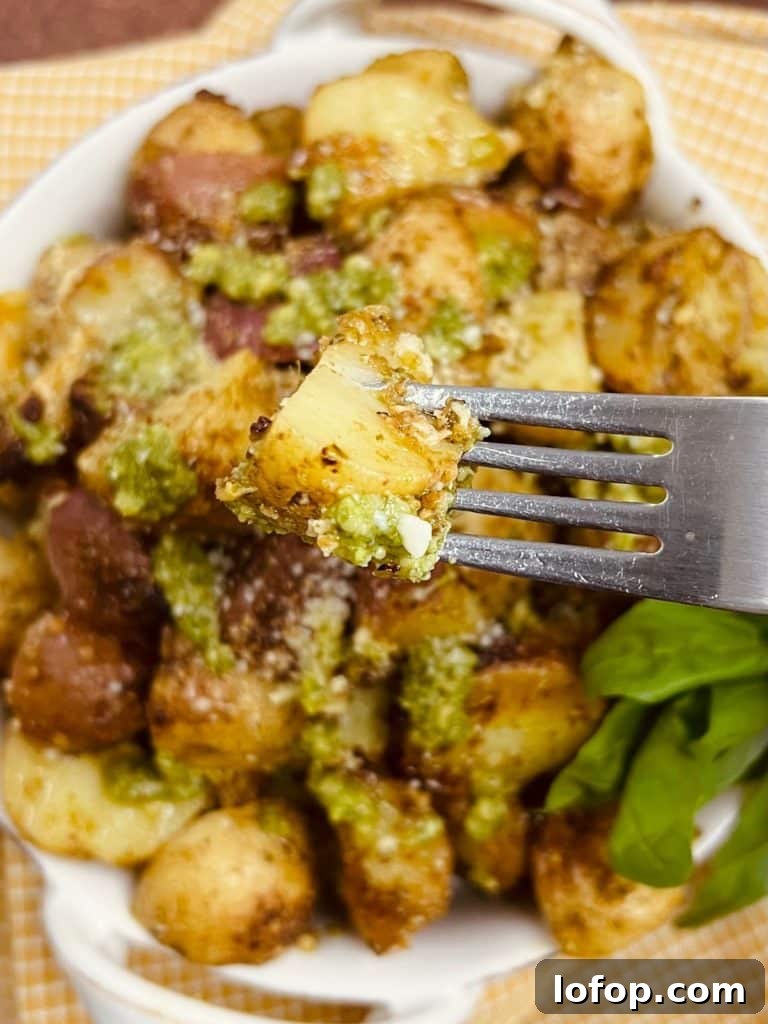 Pesto Roasted Potatoes Styled Photo on Fork.