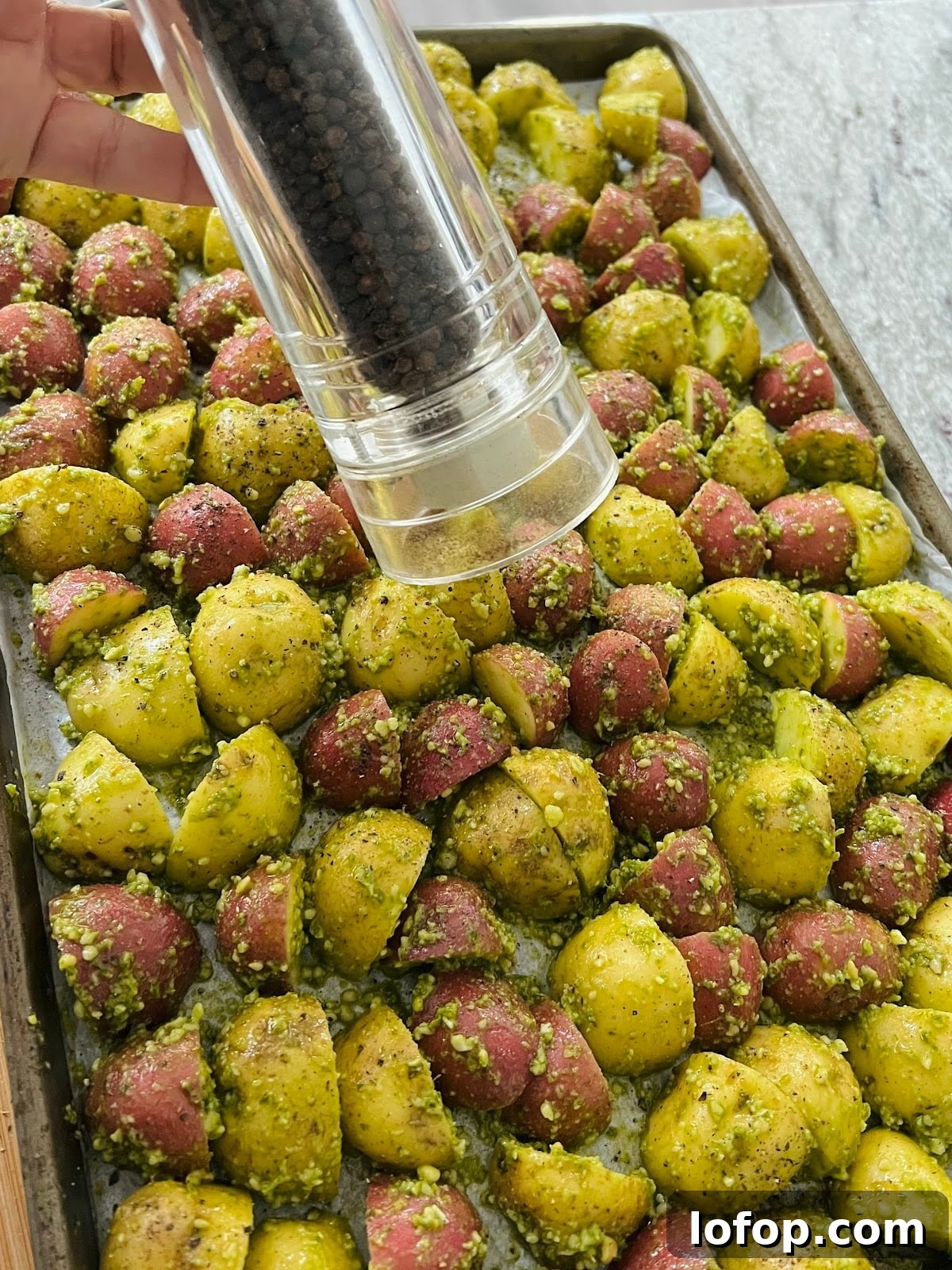 Pesto Potatoes on Sheet Pan with Black Pepper.