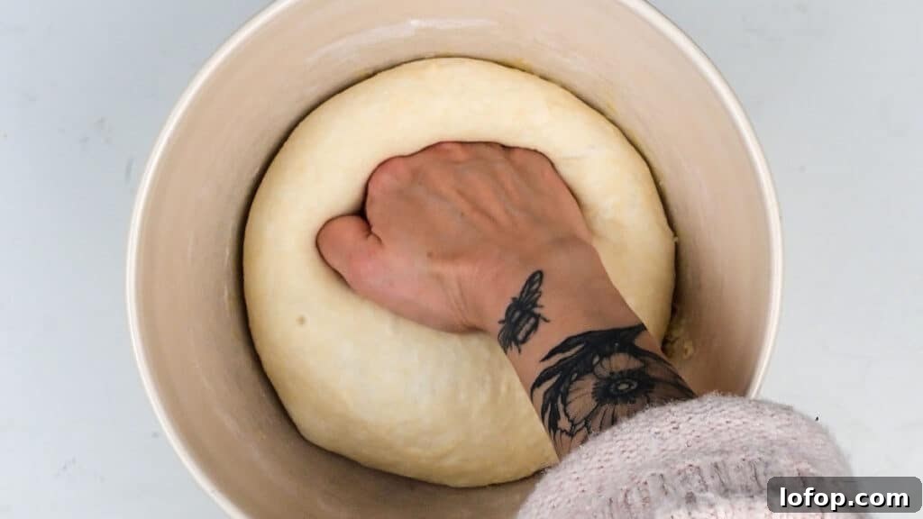 Punching dough to deflate