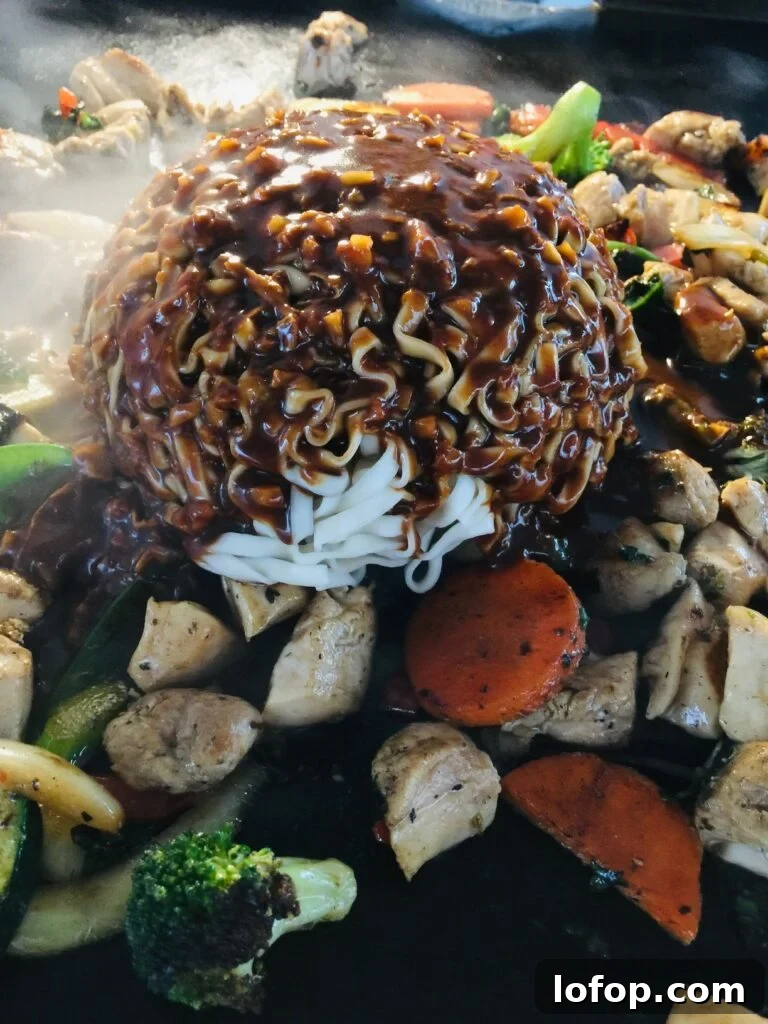adding noodles and sauce