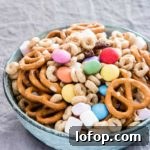 a bowl of sweet and salty snack mix