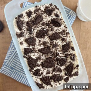 3 ingredient oreo ice cream with oreo cookies on top in bread pan