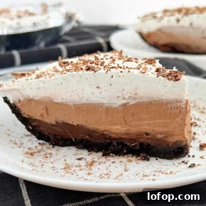 no bake chocolate pudding pie with jello pudding and cool whip on a plate