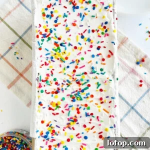 ice cream sandwich cake with sprinkles in loaf pan