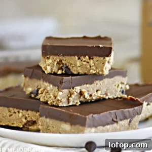no bake chocolate peanut butter bars stacked on a white plate