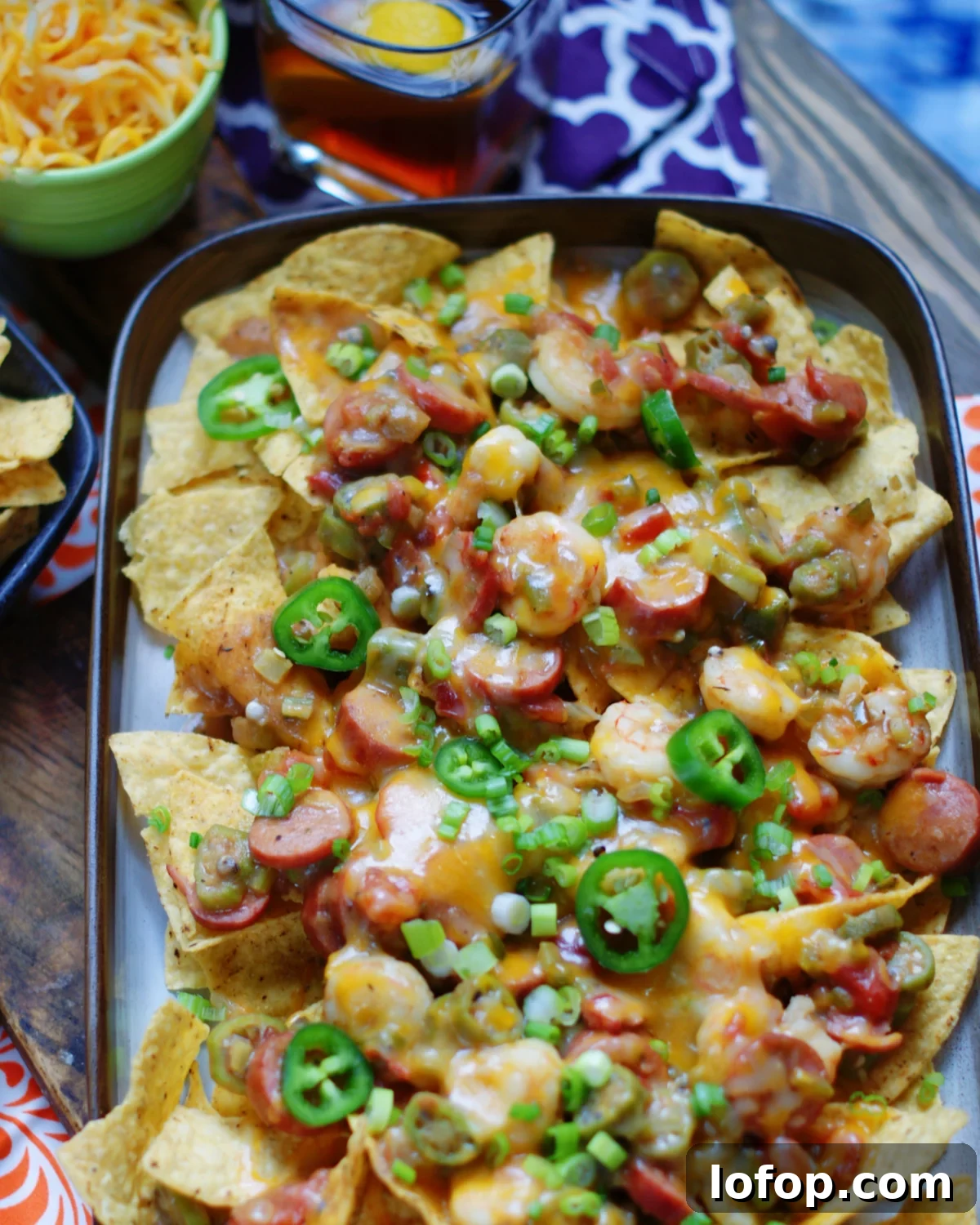 A platter full of the best recipe for nachos with Louisiana Gumbo.