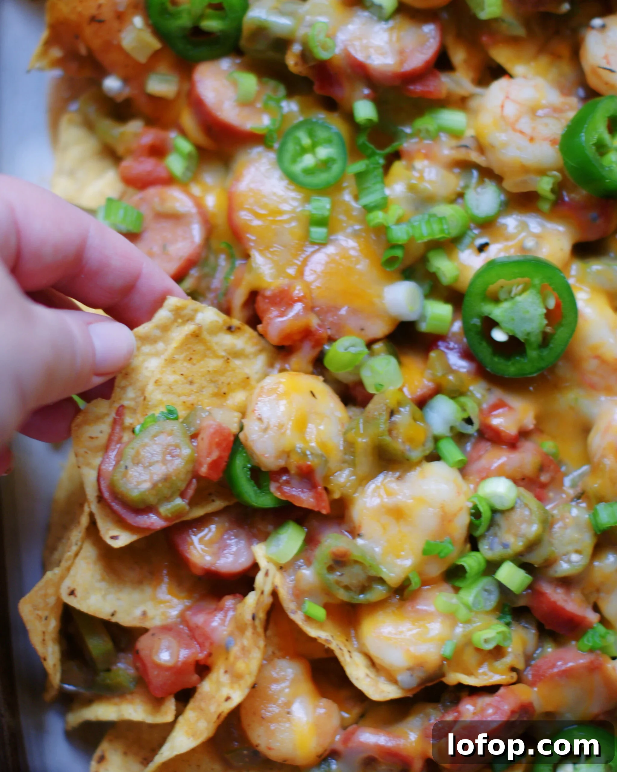 An close up of a shrimp gumbo nacho for Super Bowl.