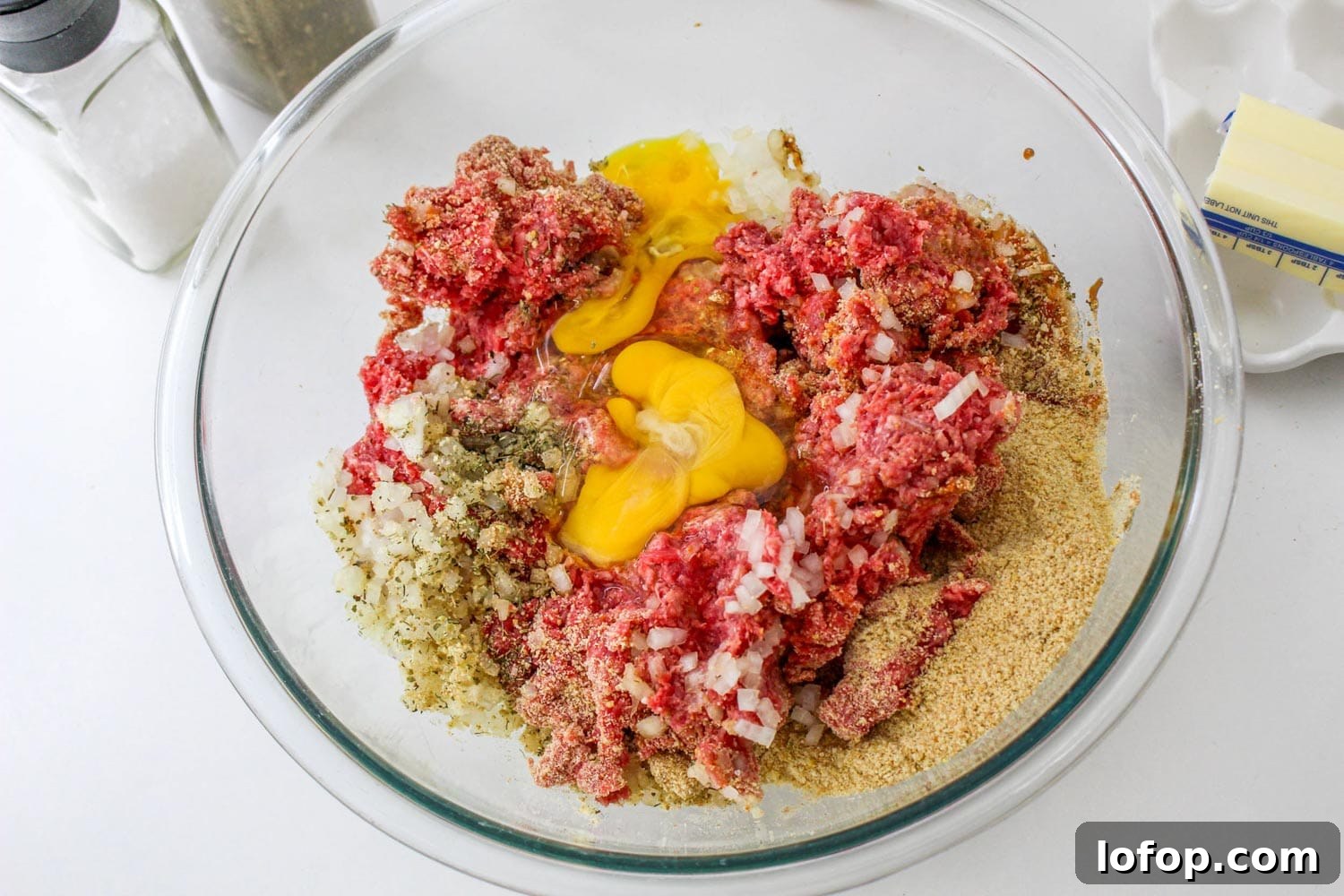 Savory Mushroom Meatloaf with Rich Mushroom Gravy 4 Meatloaf ingredients in a bowl before mixing