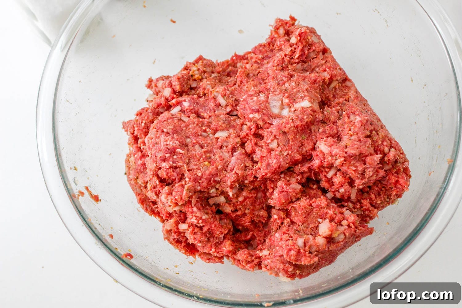 Savory Mushroom Meatloaf with Rich Mushroom Gravy 5 Meatloaf mixture in a glass bowl