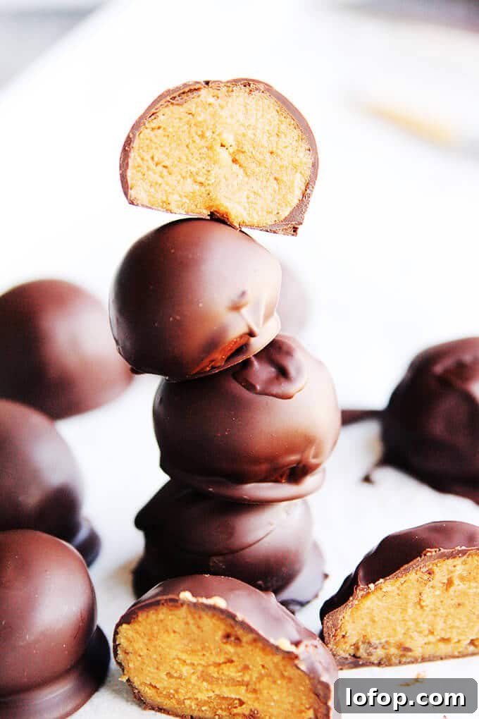 3 low-fat peanut butter balls in a stack.