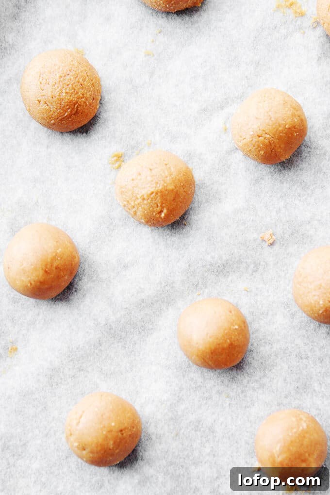 Dough balls on a baking sheet.