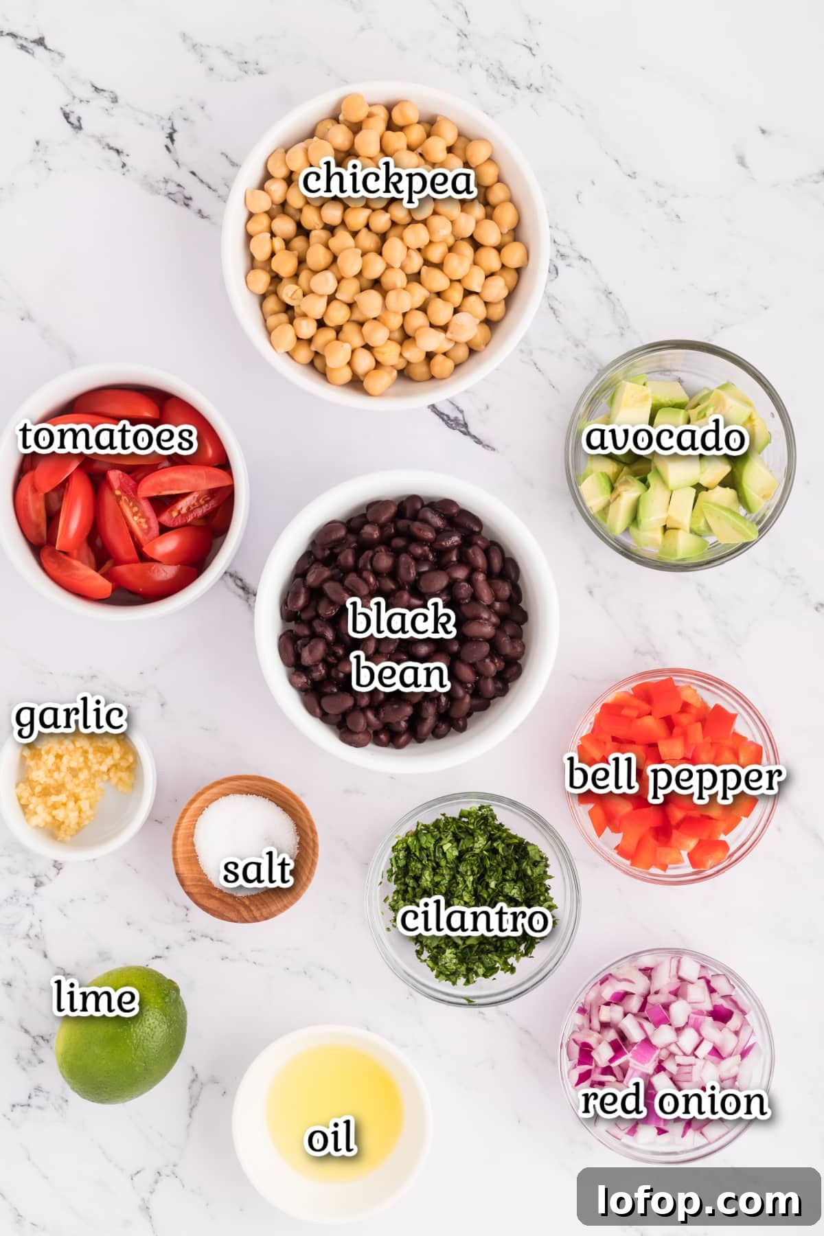 Recipe ingredients on a white marble surface.