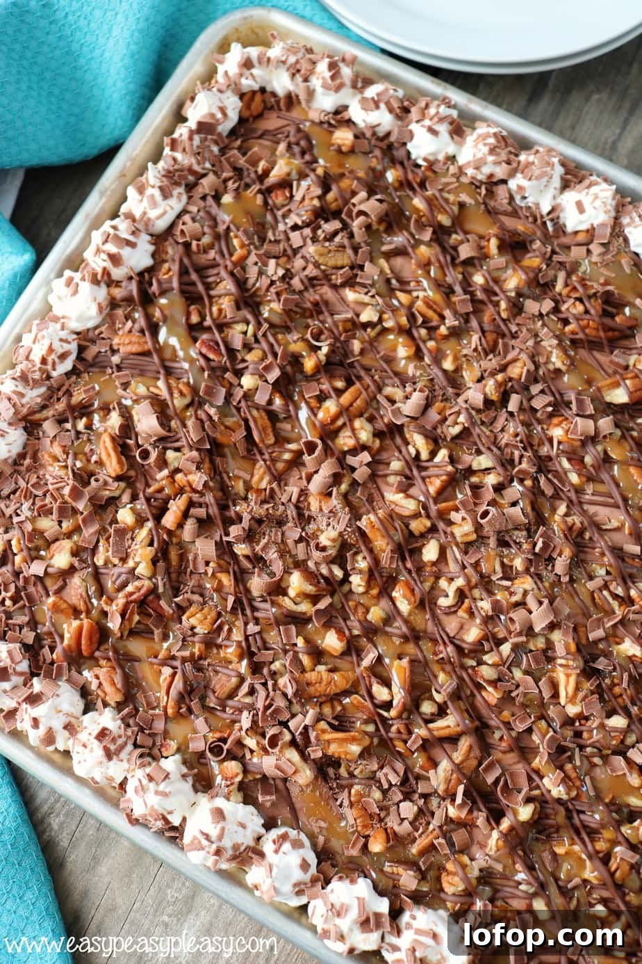 Chocolate Turtle Slab Pie: Caramel, Pecans & Chocolate Recipe 2 This Chocolate Turtle Slab Pie recipe is the perfect dessert to feed a crowd.