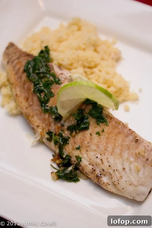 Tilapia with green sauce and couscous.