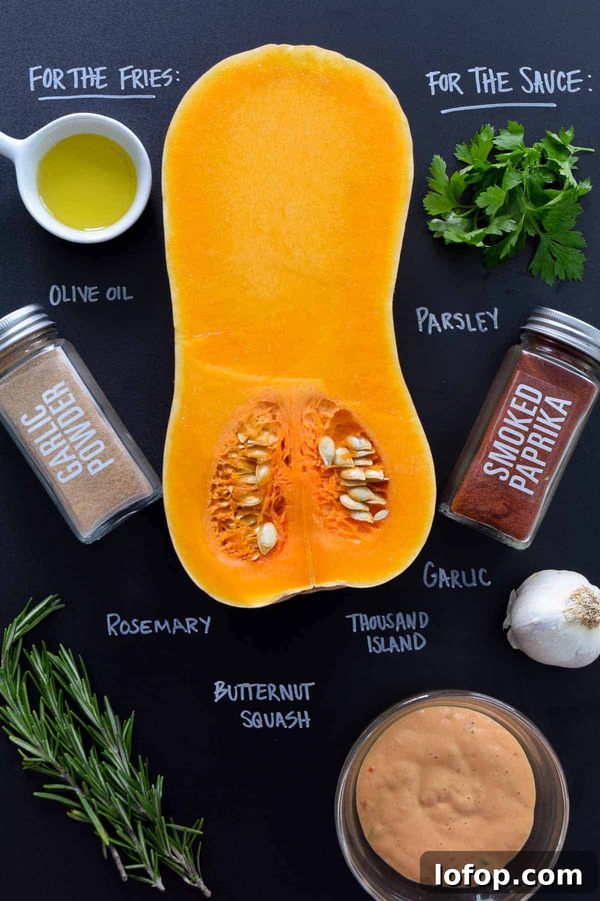 Crispy Butternut Squash Fries with Savory Magic Sauce 4 ingredients laid out on black chalkboard with names of each written in chalk
