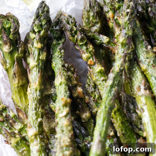 Smoked Carrots Recipe: Tender, Smoky Glazed Carrots in 30 Minutes 12 Asparagus on a serving board.