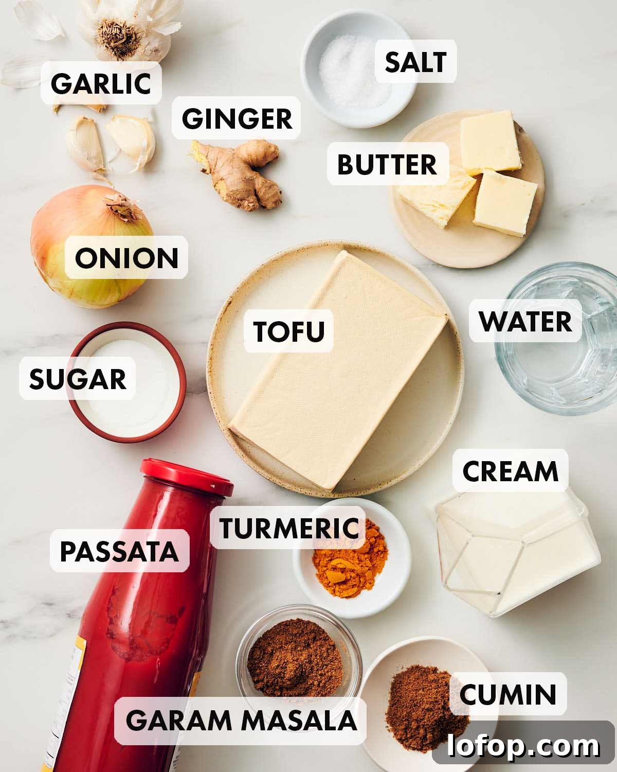Ingredients to make easy vegetarian butter chicken laid out on kitchen counter.