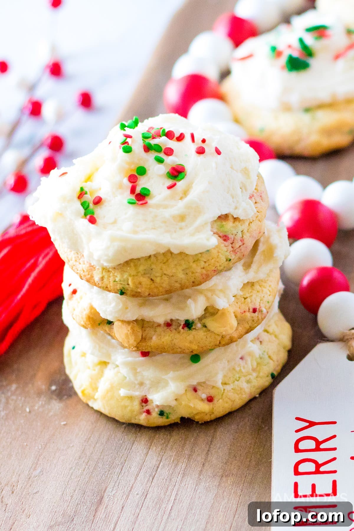 Funfetti Cake Mix Cookie Recipe for Soft, Chewy Treats 2 stack of frosted cookies