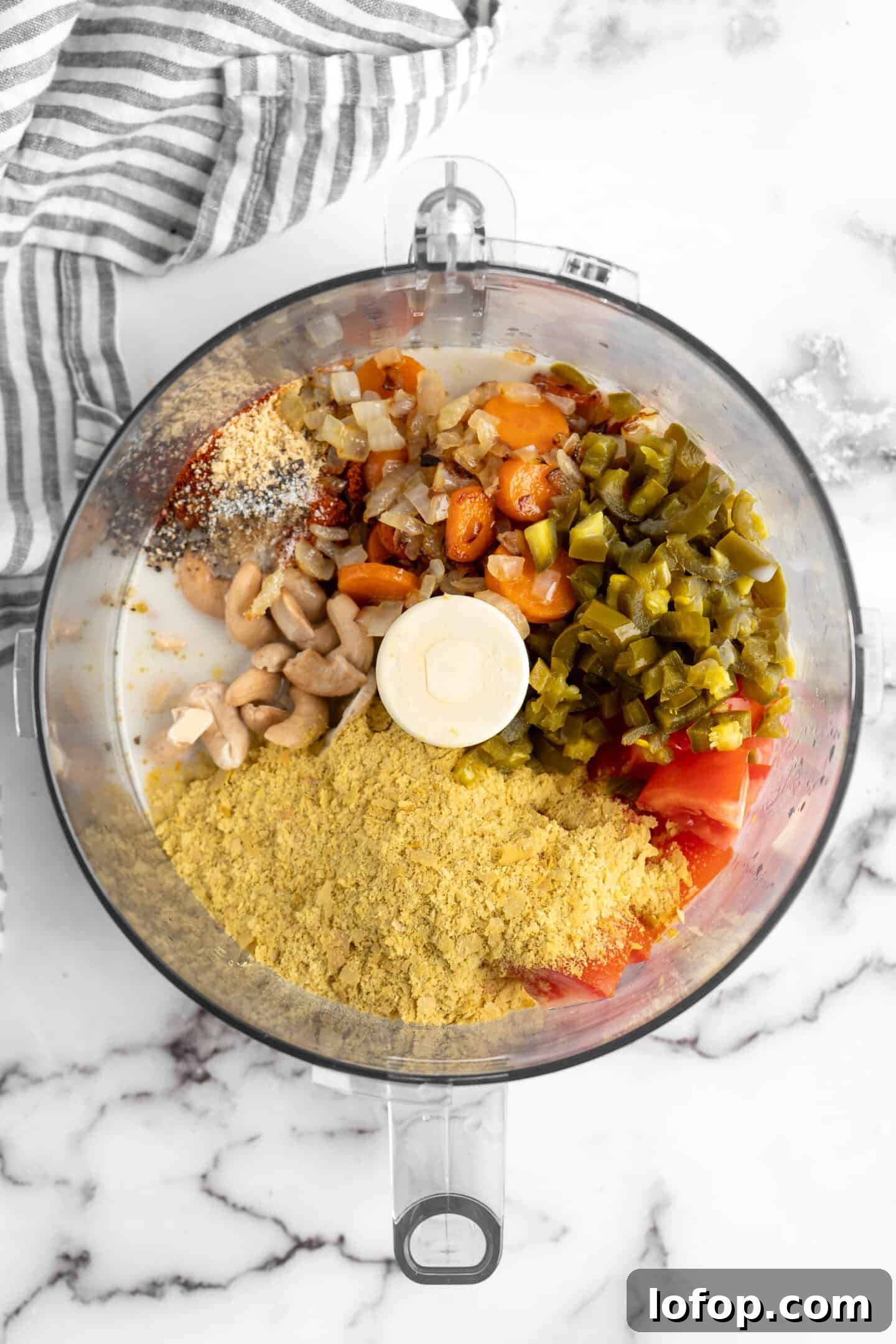 Ingredients for vegan queso in a food processor