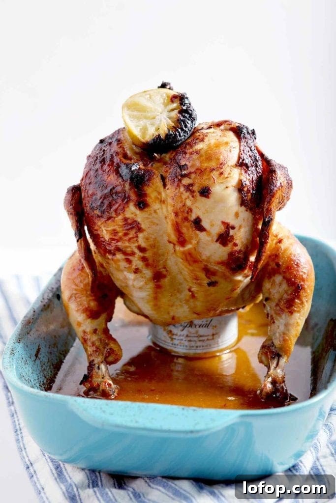Spicy Chipotle-Lime Beer Can Chicken Recipe 3 beer can chicken in a blue pan