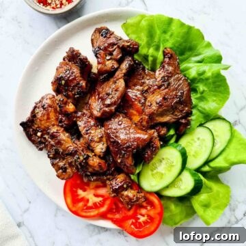 A plate of caramelised pork chops