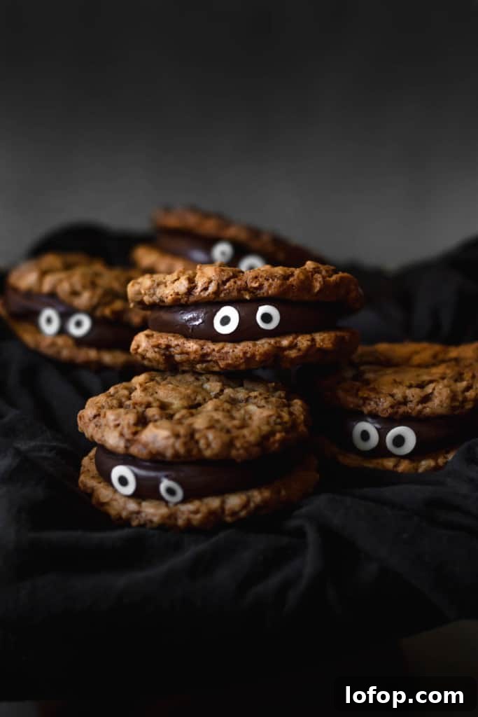 Quick Halloween Cookie Recipes: Festive Spooky Treats in Minutes 6 Chocolate fudge sandwiched between two oatmeal cookies make for a delicious and spooky treat!