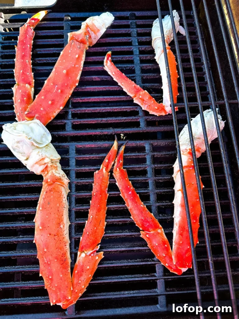 Garlic Butter Grilled King Crab Legs Recipe 4 king crab legs on a grill