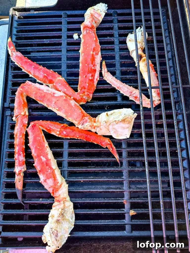 Garlic Butter Grilled King Crab Legs Recipe 5 king crab legs on a grill