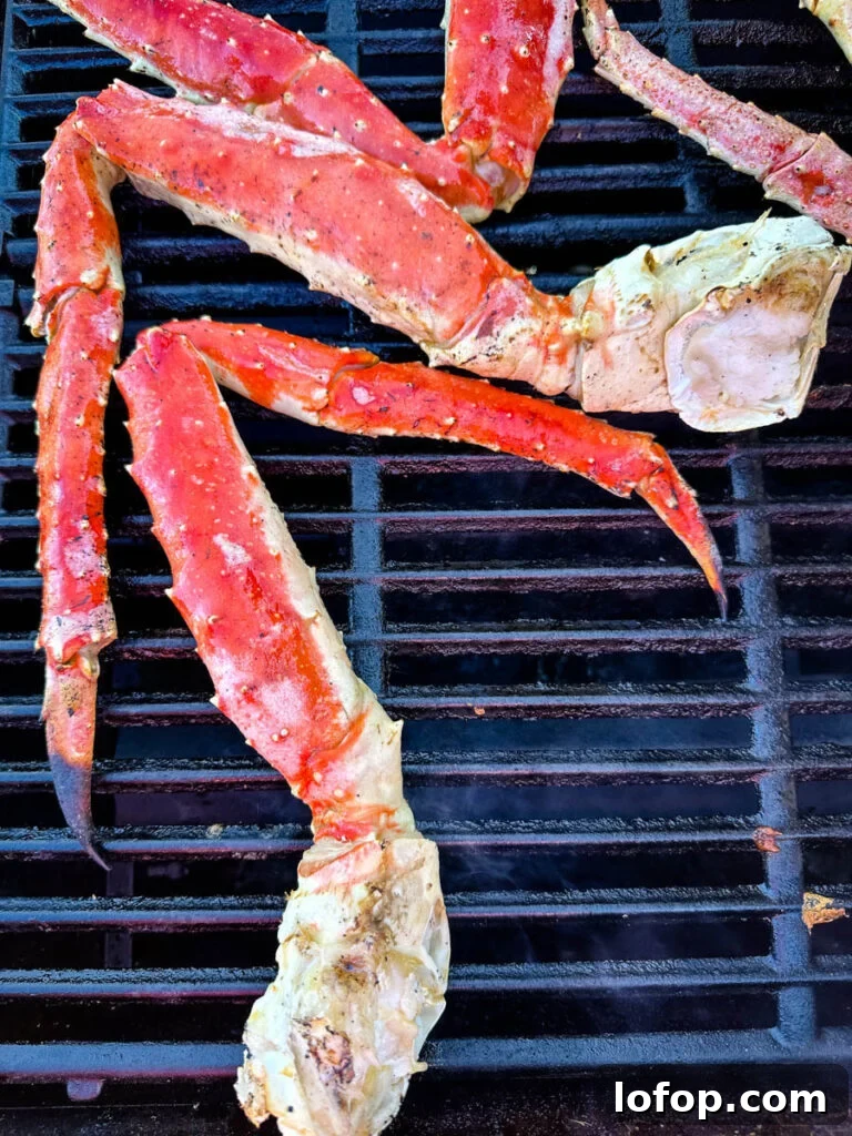 Garlic Butter Grilled King Crab Legs Recipe 6 king crab legs on a grill