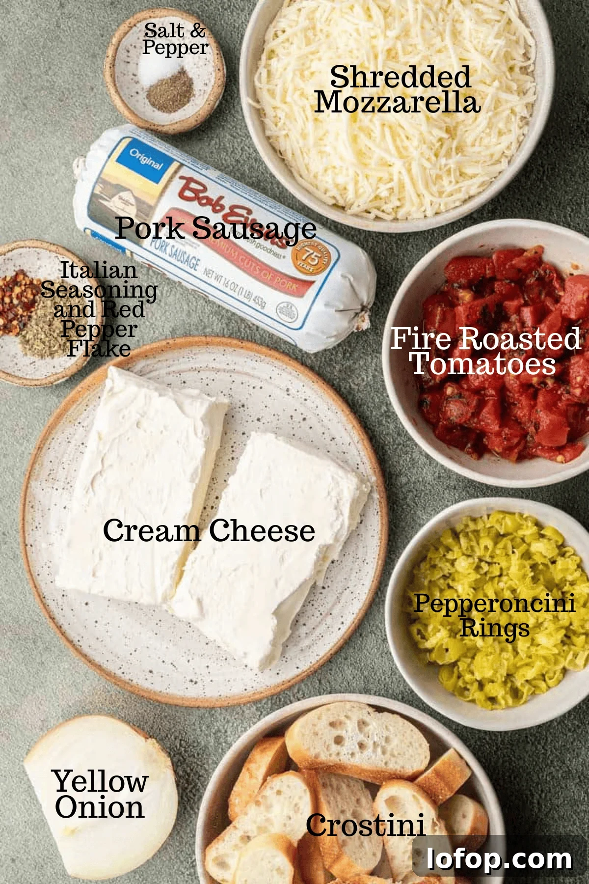 Photo of ingredients for Spicy Italian Sausage Dip with labels.
