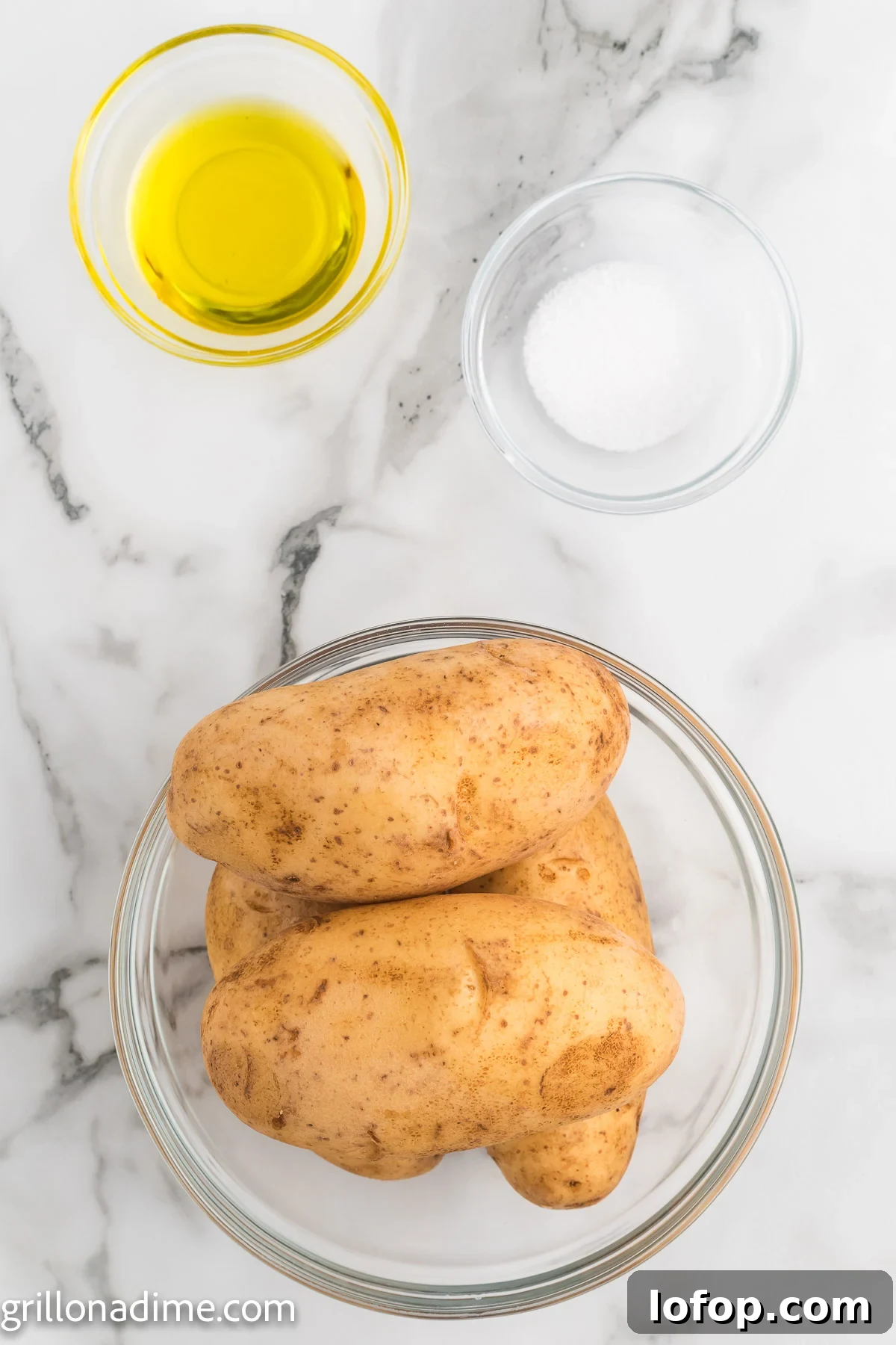 Smoked Baked Potatoes Recipe: Crispy Skins and Tender Centers 3 Oil, salt and baked potato in a bowl