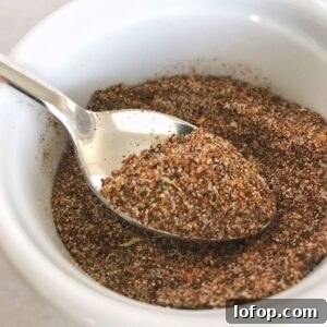 Homemade Taco Seasoning Recipe for Authentic Flavor 5 taco seasoning in small bowl with spoon