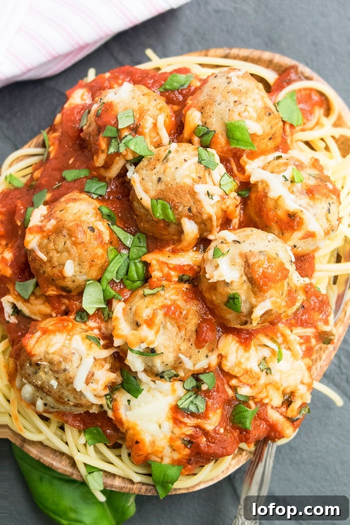One-Pan Meatball Casserole with Cheesy Tomato Sauce 2 Plate of Spaghetti and Homemade Meatball Parmesan on Black Board