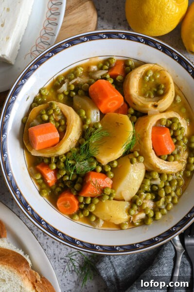 Aginares à la polita is a traditional vegan Greek artichoke stew.