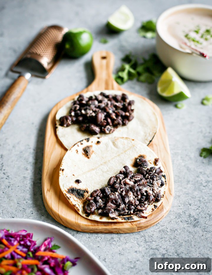 Crispy Black Bean Tacos with Cilantro-Lime Slaw 4 photo of black bean tacos being prepared
