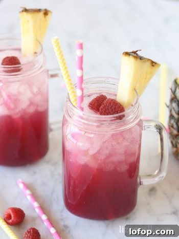 This raspberry crush is the best party punch recipe ever! Get the recipe on lizoncall.com