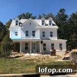 white brick house in the building construction phase