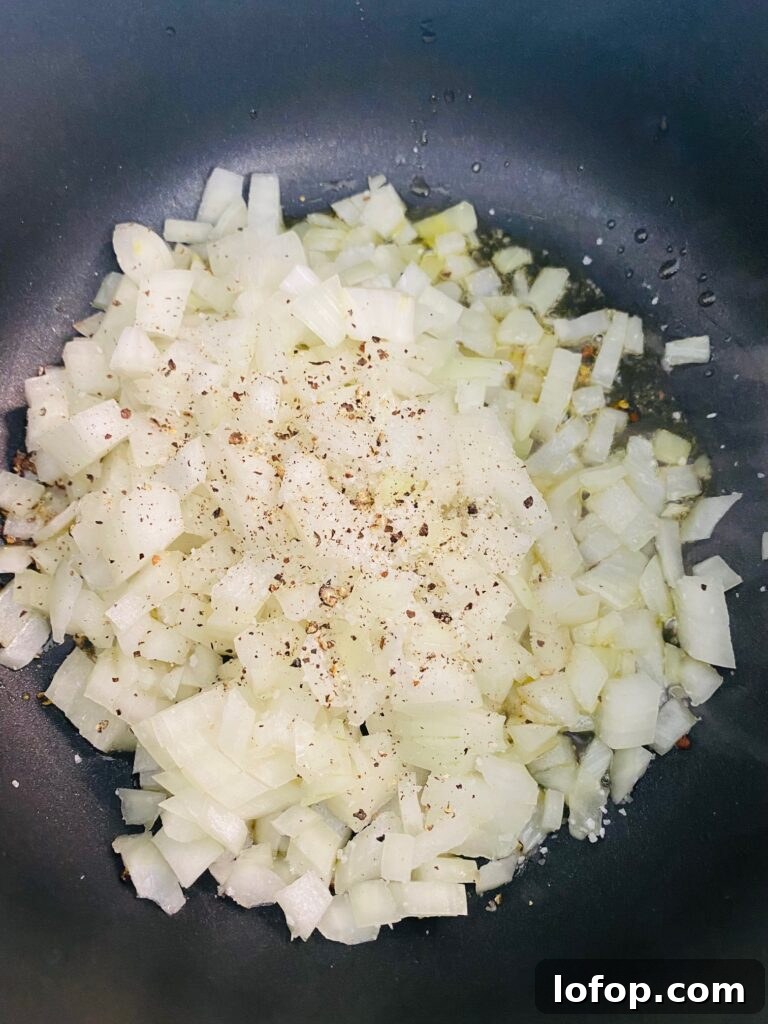 onions cooking in a pot