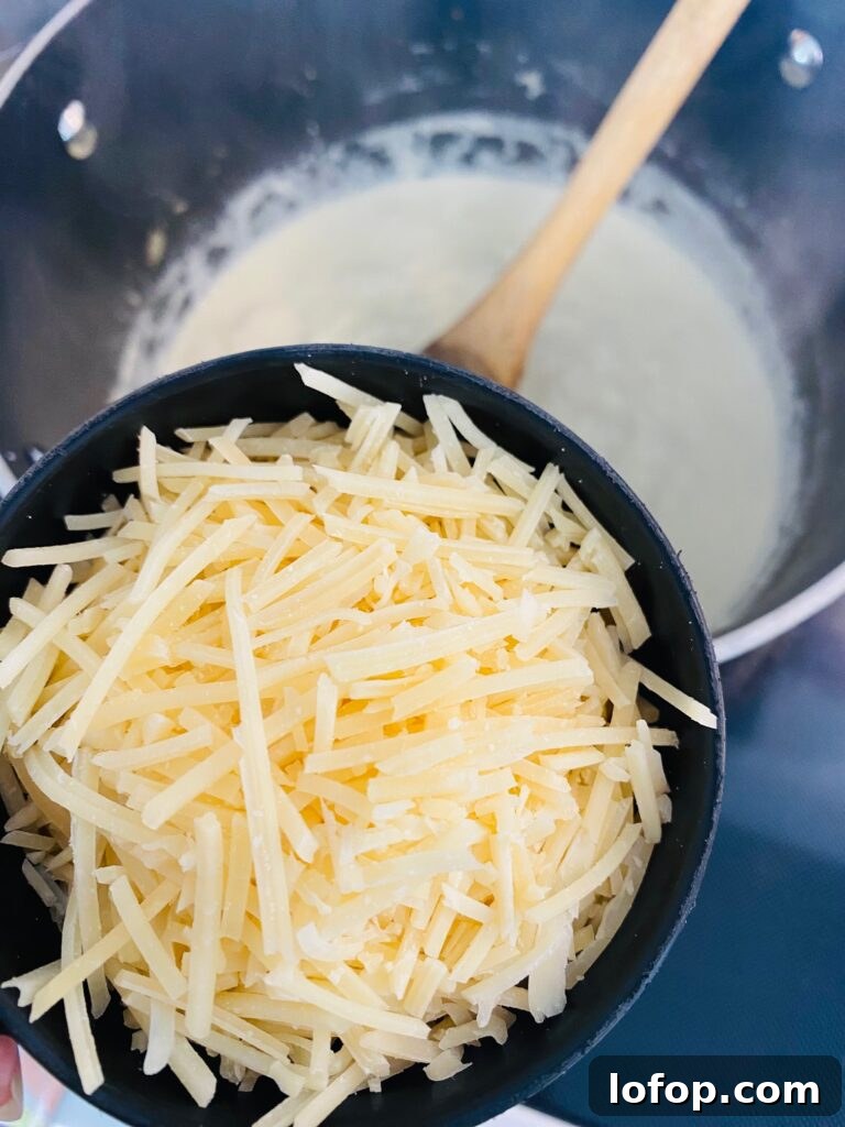 adding parmesan cheese