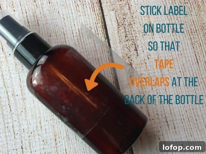Essential Oil Hand Sanitizer Spray — Antibacterial & Refreshing 11 stick label on bottle so that tape overlaps at the back of the bottle