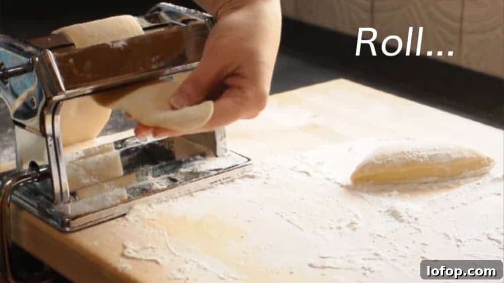 How to Make Authentic Homemade Ramen Noodles from Scratch 11 Rolling Ramen Noodle Dough in pasta machine
