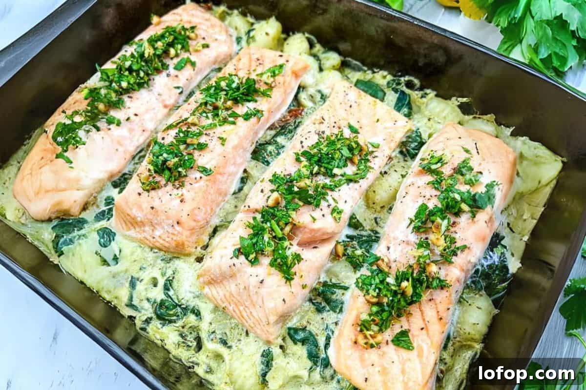31 Irresistible Seafood Dinners to Add Fish to Your Weekly Menu 19 Salmon Gnocchi Bake with Gremolata on a dish.